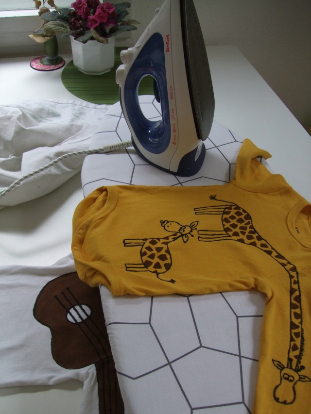 ironing baby romper to make it washing machine safe
